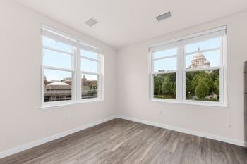 Plank flooring in kitchen and living room